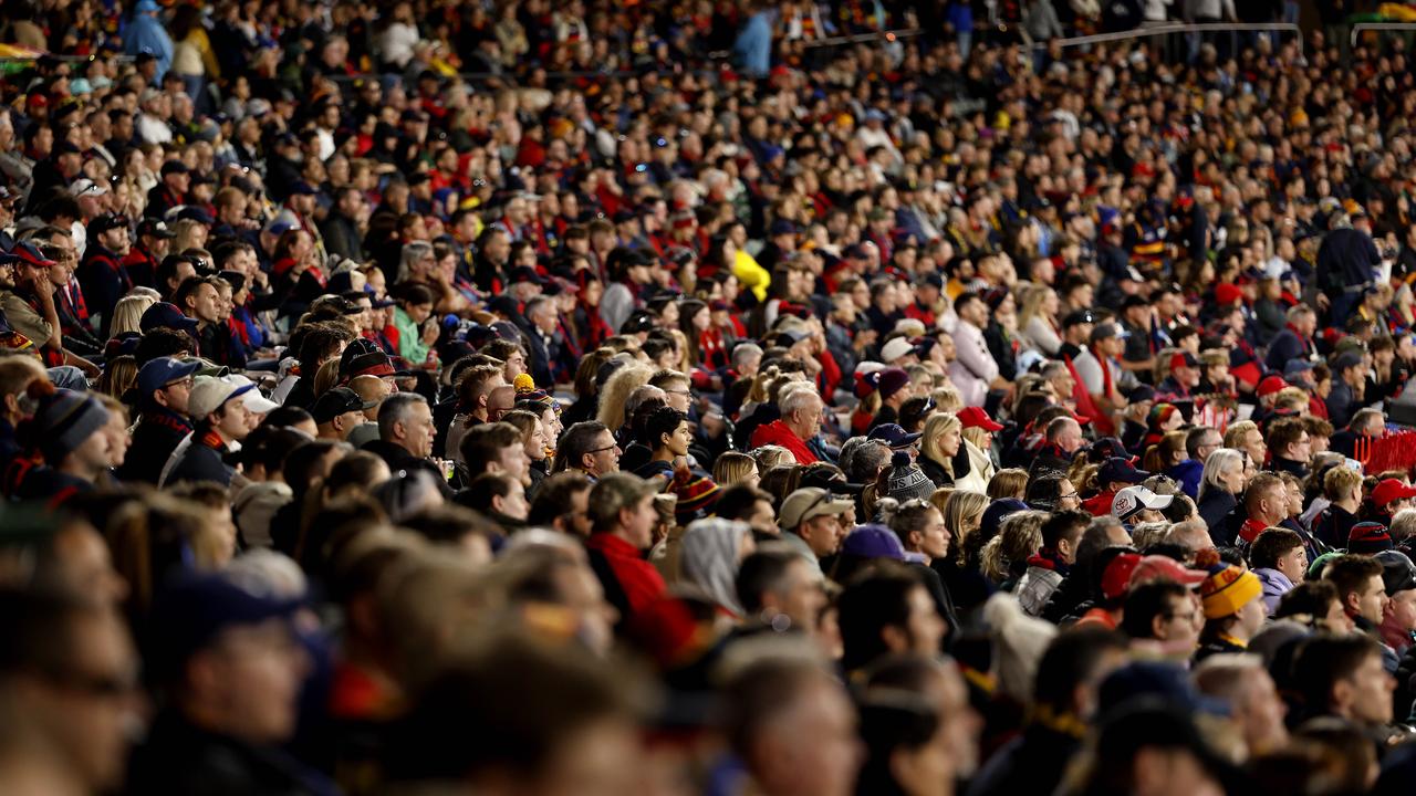 Fans during the AFL Gather Round match between the Adelaide Crows and Melbourne Demons at the Adelaide Oval on April 4. Photo by Phil Hillyard