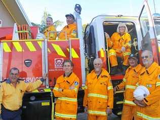 HAPPY 50TH: The Clunes Fire Brigade will open its doors on Sunday November 11 to cleebrate its 50th Birthday. Brigade captain Neville Battistuzzi (second on left in back of truck) said the while community is welcome to attend the party. Picture: Alison Paterson