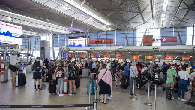 The airport is expecting about 120,000 travellers each day for Thursday and Friday. Picture: NCA NewsWire / Simon Bullard