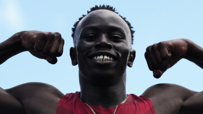 BRISBANE, AUSTRALIA - DECEMBER 06: Gout Gout of Queensland poses after winning his Boys' U18 100m heat in 10.04 seconds with a +3.4 tail-wind during the 2024 Chemist Warehouse Australian All Schools Athletics Championship at Queensland Sport and Athletics Centre on December 06, 2024 in Brisbane, Australia. (Photo by Cameron Spencer/Getty Images)