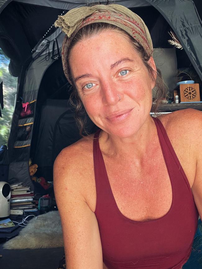 Lucy Aura, mother to five-year-old Asa and seven-year-old Alana, moved into a 10-man tent in February after splitting with her partner. Picture: Lucy Aura