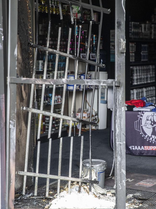 The front door of AAA Supplements in Frankston after the attack. Picture: Sarah Matray