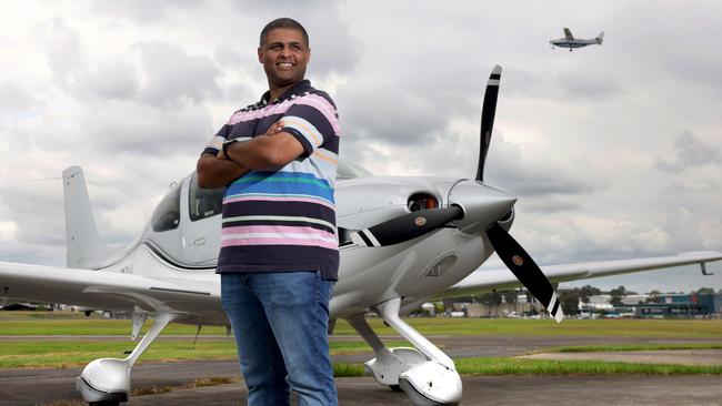 ****EMBARGOED UNTIL WEDNESDAY 20TH NOVEMBER, 2024. SEE EMMA BLAKE BEFORE USE. ****Sunil Thomas is a General Manager with CommBank and volunteer pilot with Angel Flight. Pictured with his single engine light plane at Bankstown airport which he uses to fly patients from rural and remote areas, to the city for treatment. Sunil has completed over 35 flights across New South Wales since 2015. Picture: Toby Zerna