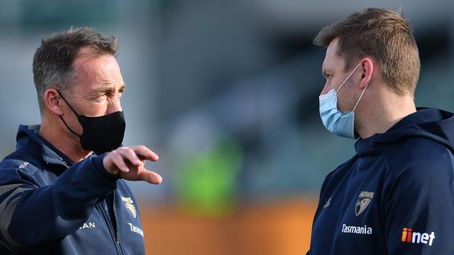 LAUNCESTON, AUSTRALIA – AUGUST 01: Alastair Clarkson Head Coach of the Hawks and Sam Mitchell, Head of Development of the Hawks are seen during the round 19 AFL match between Hawthorn Hawks and Brisbane Lions at University of Tasmania Stadium on August 01, 2021 in Launceston, Australia. (Photo by Steve Bell/AFL Photos/via Getty Images)