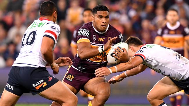 BRISBANE, AUSTRALIA - MAY 17: Tevita Pangai of the Broncos charges into the defence during the round 10 NRL match between the Brisbane Broncos and the Sydney Roosters at Suncorp Stadium on May 17, 2019 in Brisbane, Australia. (Photo by Bradley Kanaris/Getty Images)