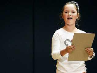 Laura Cameron speaking during the impromptu reading nine years and under section at the Ipswich Junior Eisteddfod. Picture: Photo Claudia Baxter