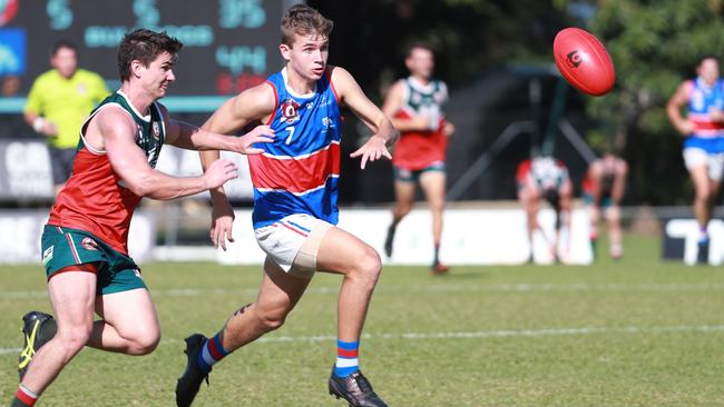 Bulldogs' Harry Cook and Cutters' Jake Johansen during a local Cairns game held at Fretwell Park. Picture: Brendan Radke