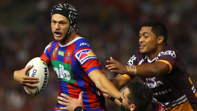 NEWCASTLE, AUSTRALIA — APRIL 07: Kalyn Ponga of the Knights is tackled during the round five NRL match between the Newcastle Knights and the Brisbane Broncos at McDonald Jones Stadium on April 7, 2018 in Newcastle, Australia. (Photo by Tony Feder/Getty Images)