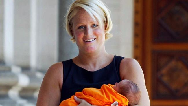 24/02/2003. Former  world champion aerial skier and member for Forrest Hill Kirstie Marshall with her week old baby girl Charlotte Louise at Parliament House. Digital Image.