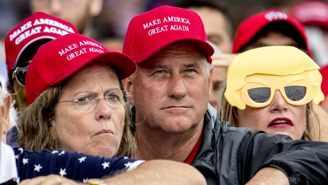 Guests wearing MAGA caps arrive for Donald Trump's 'Salute to America' event. Picture: AP.