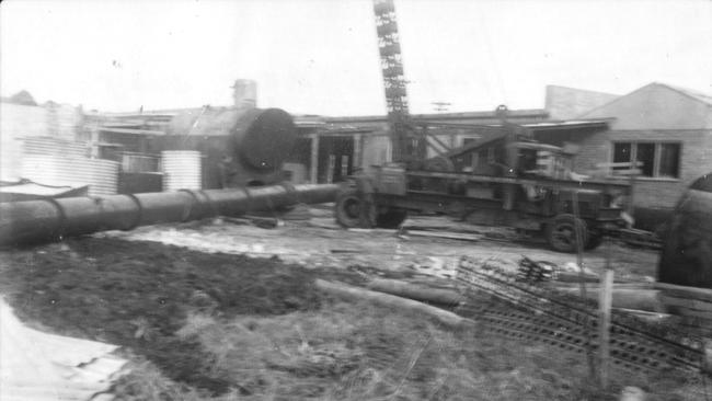 Lifting the stack on to the boiler at the Brookvale Brewing Co in 1950. Picture Marin Alagich, Northern Beaches Library