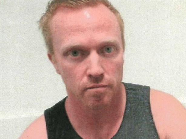 Exhibit D - Trial 2 Exhibits from the rape trial of Adrian Bayley, who killed Jill Meagher. Photos depicting the tattoo on the arm of Adrian Bayley
