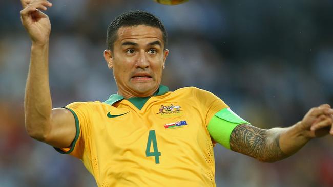 SYDNEY, AUSTRALIA - JANUARY 13: Tim Cahill of Australia jumps to head the ball during the 2015 Asian Cup match between Oman and Australia at ANZ Stadium on January 13, 2015 in Sydney, Australia. (Photo by Mark Kolbe/Getty Images)