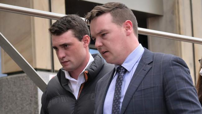 Kobe Brenden McCauley (left) with his defence lawyer. Picture: Kenji Sato