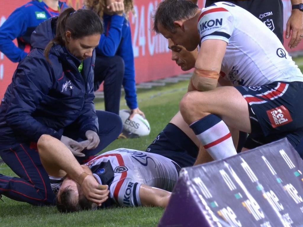 Josh checks on Brett Morris after the injury.