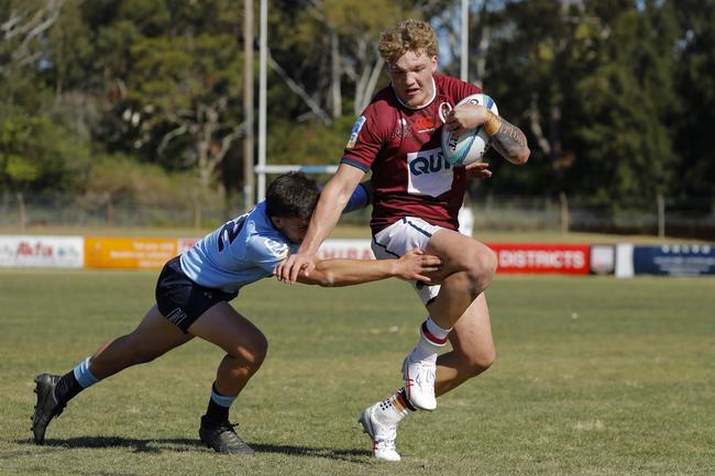 Ryley Bierton runs the ball for the ball for the Reds under-19s in 2023. Picture: Karen Watson