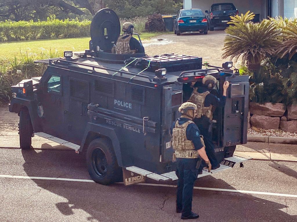 Heavily-armed police officers swarmed on a Cullen Bay Crescent home where they arrested 53-year-old Roy Daye last week. Picture: Supplied