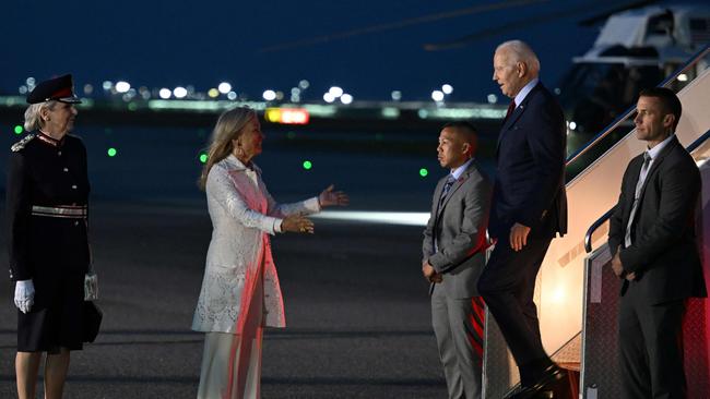 Joe Biden is greeted by US ambassadoer Jane Hartley as he disembarks at Stansted on Sunday night. Picture: AFP