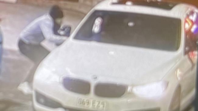 The masked offender is believed to have been wearing a balaclava during the Southport theft Picture: Supplied