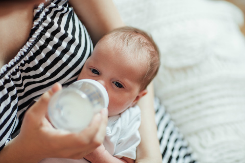 Baby gets fussy store while bottle feeding