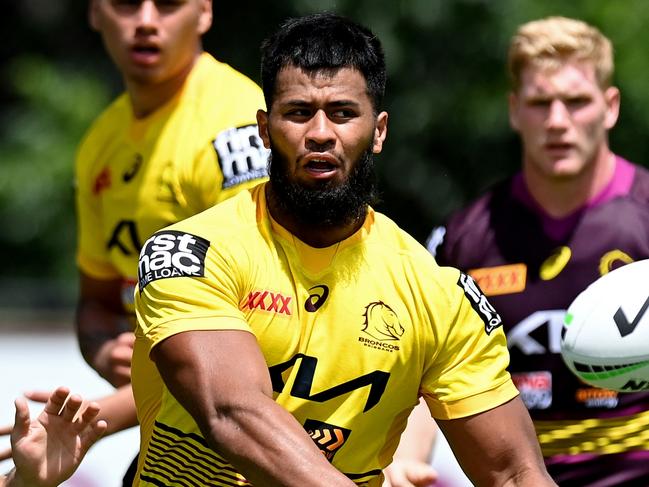 BRISBANE, AUSTRALIA - FEBRUARY 07: Payne Haas passes the ball during a Brisbane Broncos NRL training session at the Clive Berghofer Centre on February 07, 2022 in Brisbane, Australia. (Photo by Bradley Kanaris/Getty Images)