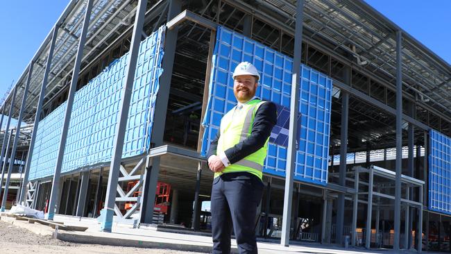 Camden councillor Michael Morrison outside the under-construction Oran Park Library and Community Centre.