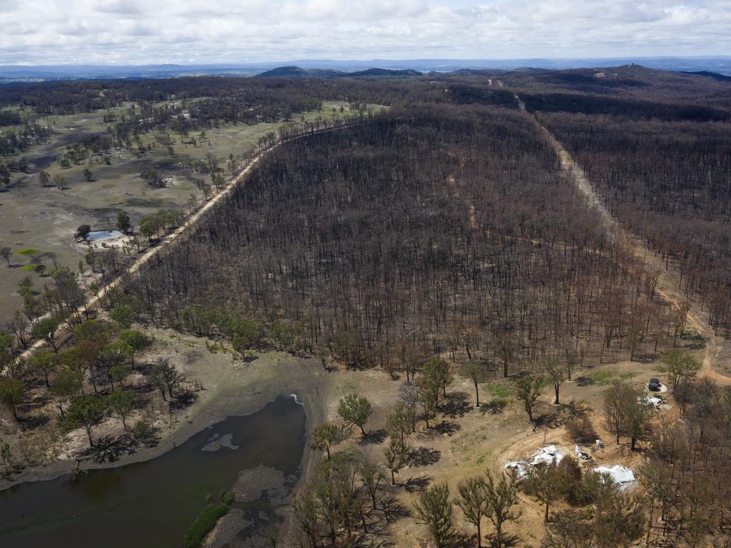 An aerial view of fire-ravaged bushland and a burned home in the NSW village of Torrington after the 2019-2020 bushfires. Photo: Brook Mitchell/Getty Images