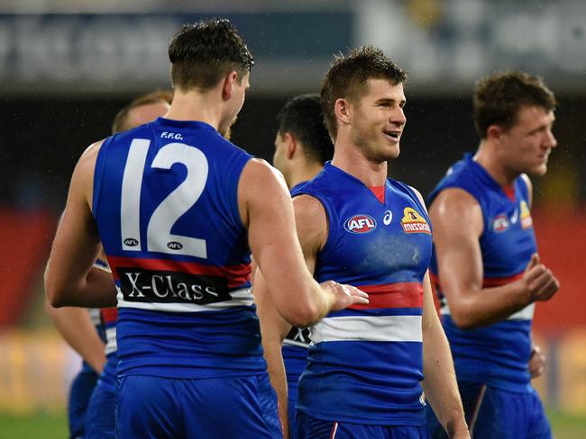 GOLD COAST, AUSTRALIA - JULY 23: Billy Gowers of the Bulldogs celebrates victory during the round 8 AFL match between the Gold Coast Suns and Western Bulldogs at Metricon Stadium on July 23, 2020 in Gold Coast, Australia. (Photo by Matt Roberts/AFL Photos/via Getty Images)