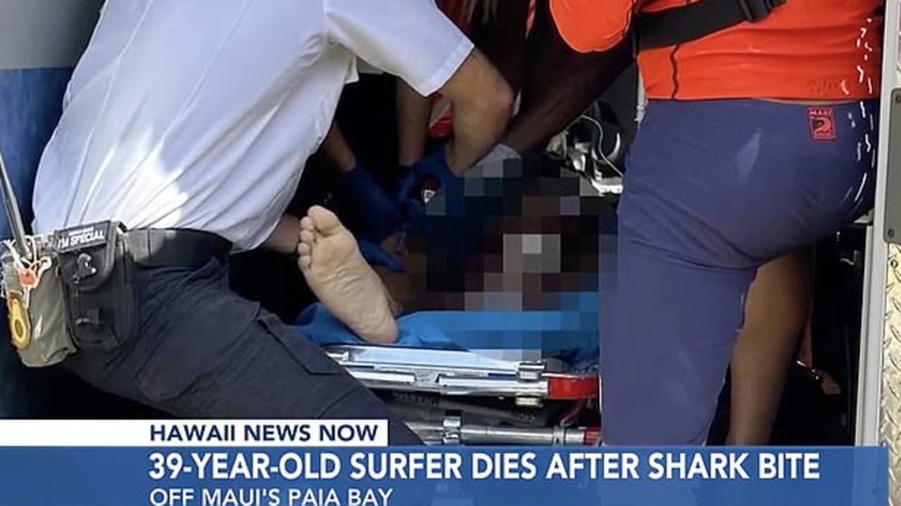 The surfer was pulled from the water by first responders. Picture: Hawaii News Now