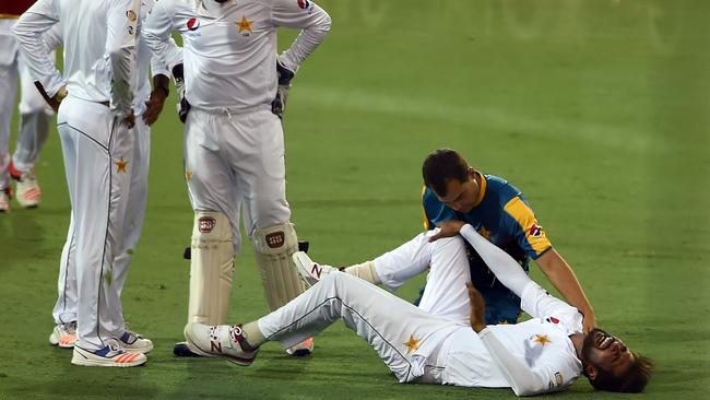 Amir lays it one a bit thick on day one of the Test. AFP Photo/Saeed Khan