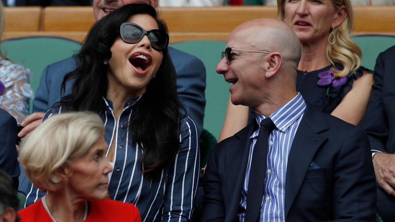 Amazon Founder and CEO Jeff Bezos (R) and his new partner US new anchor Lauren Sanchez. Picture: Adrian Dennis / Pool / AFP