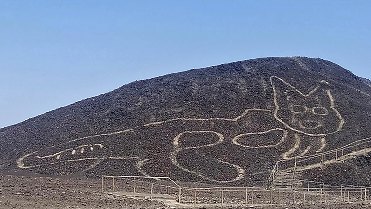 A giant cat figure etched into a slope at the UNESCO World Heritage Site in the desert near the town of Nazca in southern Peru. Picture: AFP/Peru’s Culture Ministry