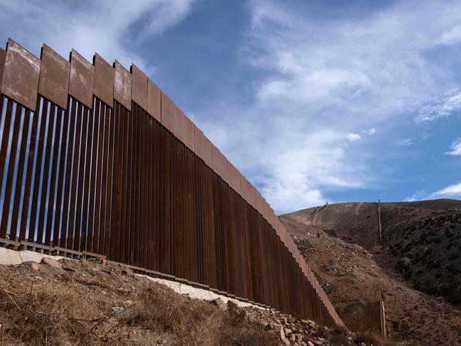 A reinforced section of the US-Mexico border fencing seen at El Nido de las Aguilas eastern Tijuana, Baja California state. Picture: Guillermo Arias / AFP