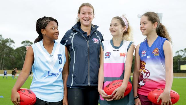 Nicola Barr at Blacktown International Sports Park with Harriet Owusu, 12, Shelby Draper, 13, Tahlia Ravello, 12. Photo: Adam Ward