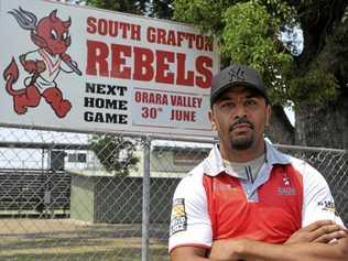 South Grafton Rebels new coach Roy Bell in front of the Rebels sign at McKittrick Park. Picture: Mitchell Keenan