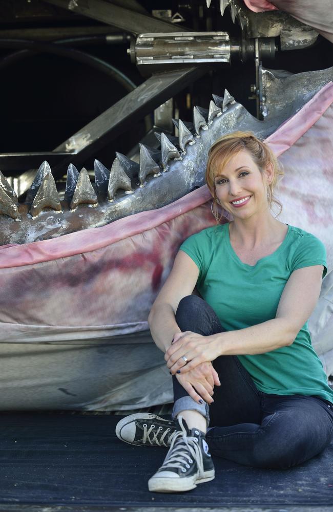 Kari Byron of the MythBusters team in front of a lifesize Megalodon model, dubbed ‘Sharkzilla’ and created by Jim Shartis, to see how strong the shark's jaws would have been. Picture: MythBusters