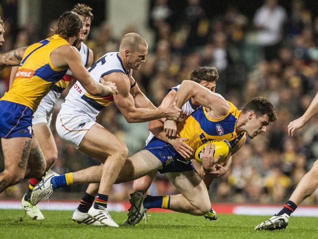 The Crows swarm Luke Shuey.
