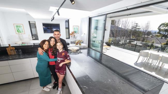 Rina and Adam Bulic, with daughters Lola and Mila, in the kitchen. Picture: Rob Leeson.