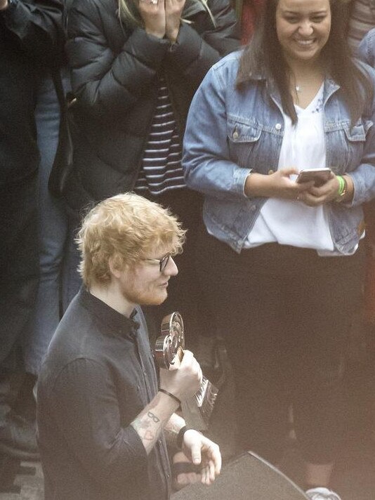 Ed Sheeran with his award Picture: Sarah Matray