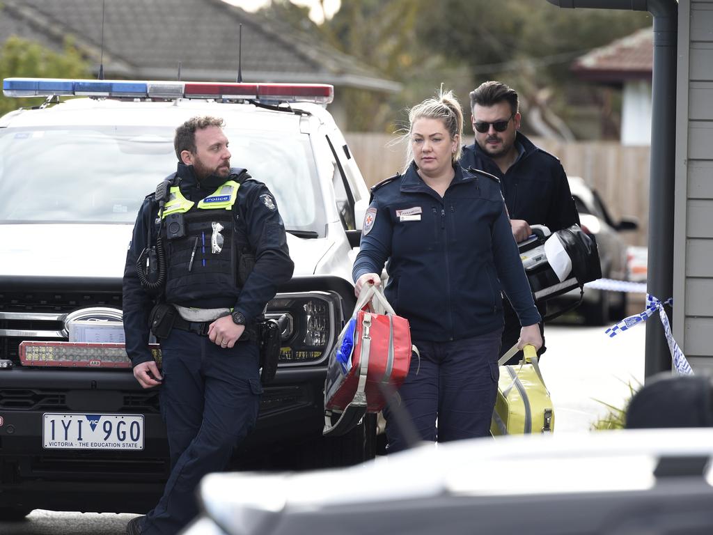 Police and ambulance officers on the scene of the fatal overdose. Picture: Andrew Henshaw