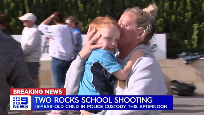 Parents collect their children from Atlantis Beach Baptist College on Wednesday afternoon following an hour of lockdown. Picture: Nine News