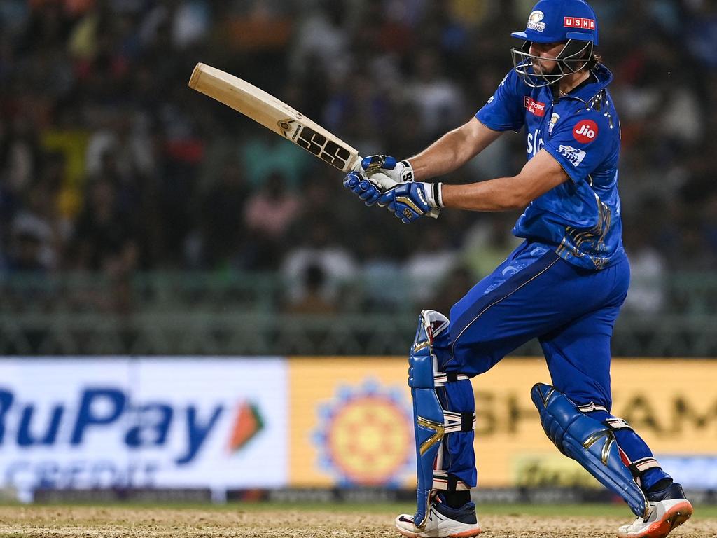 Tim David in action for the Mumbai Indians, who are rumoured to be offering Archer big money to play in the IPL. Picture: Arun Sankar/AFP