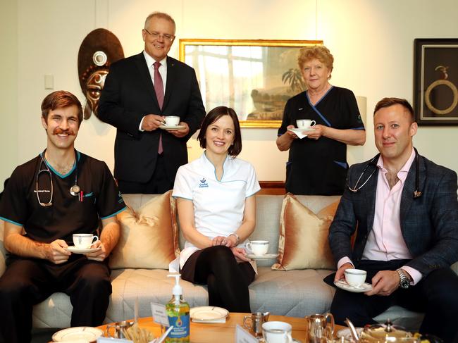 Prime Minister Scott Morrison has morning tea with some of our first responders. From left: Matthew Ensor, Rebecca Young, Wendy Beckingham and Dr James Ayres. Picture: Adam Taylor