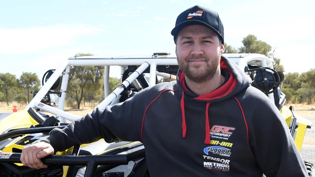 Mechanic Josh Bennett and team make the final adjustments to GRC Motorsports Can-Am Maverick 200cc. Picture: (A)manda Parkinson