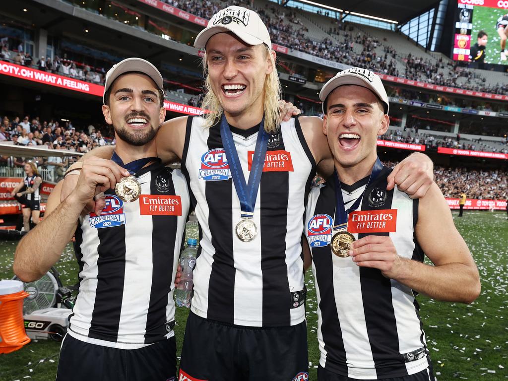 AFL Grand Final between Collingwood and the Brisbane Lions at the MCG. Nick Daicos, Darcy Moore and Josh Daicos of the Magpies. Picture: Michael Klein