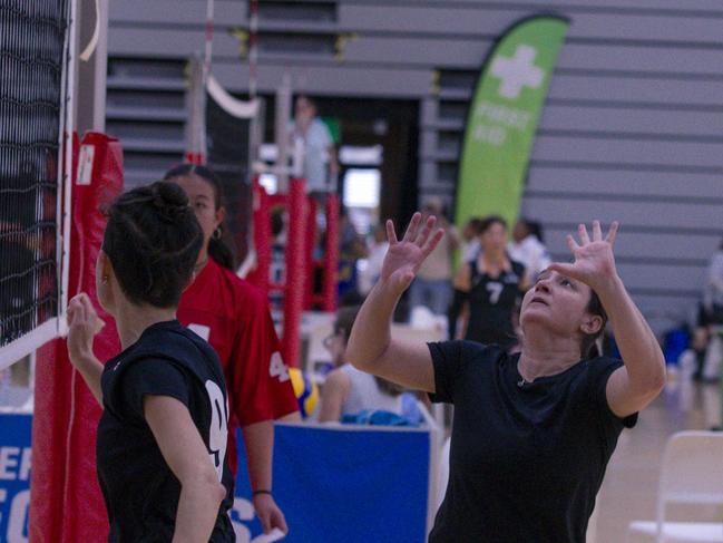 Action as the Ballina Tridents V the Seniorits in the Pan Pacific Masters Games Volletball tournament. Picture: Glenn Campbell