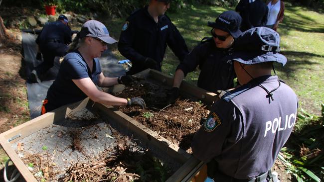 Members of Strike Force Rosann sift soil on Day 2 of their search operation for clues to the whereabouts of William Tyrrell. Picture: NSW Police