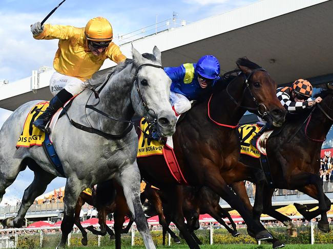 Bois D'argent holds off New Endeavour and Fawkner Park to win the Group 1 Doomben Cup. Picture: Grant Peters / Trackside Photography