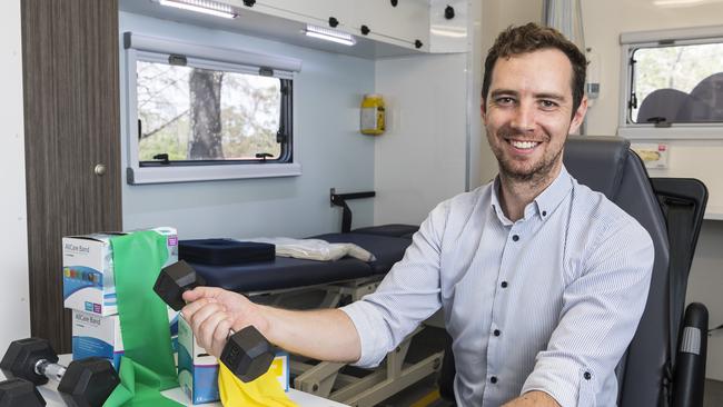 Better Movement Clinic director John Dennehy inside the mobile health clinic van the Toowoomba allied health provider is using to service rural areas. Picture: Kevin Farmer