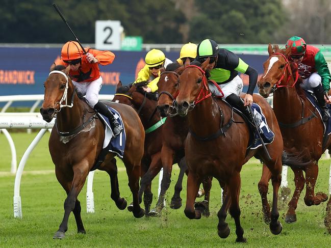 SYDNEY, AUSTRALIA - MAY 25: Jay Ford riding The Black Cloud wins Race 7 Taylor Construction  during the "Sporting Chance Cancer Foundation Raceday" - Sydney Racing at Royal Randwick Racecourse on May 25, 2024 in Sydney, Australia. (Photo by Jeremy Ng/Getty Images)